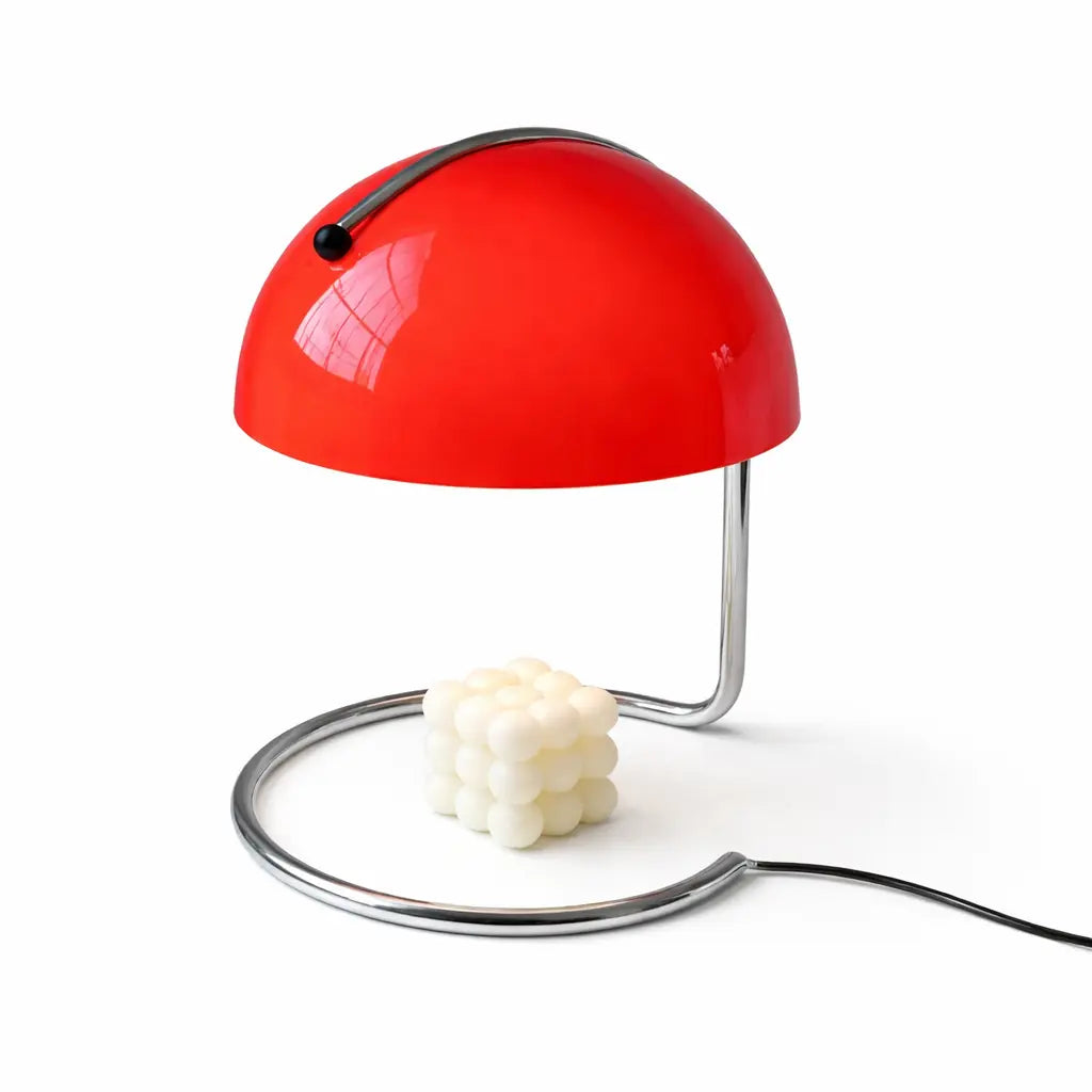 Red mid-century style candle warmer lamp with bubble candle on chrome base.