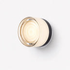 Frosted glass modern wall light with warm white glow