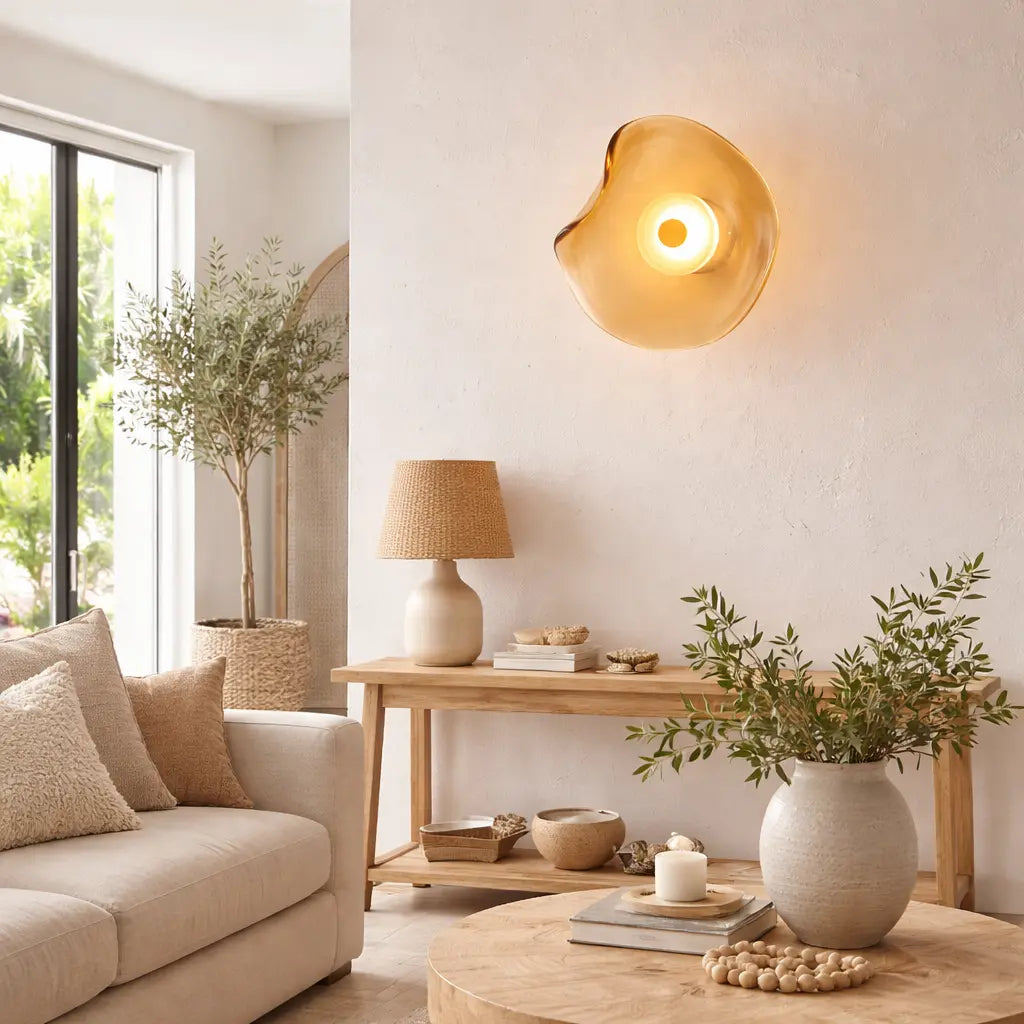 Amber organic glass wall sconce styled in modern living room