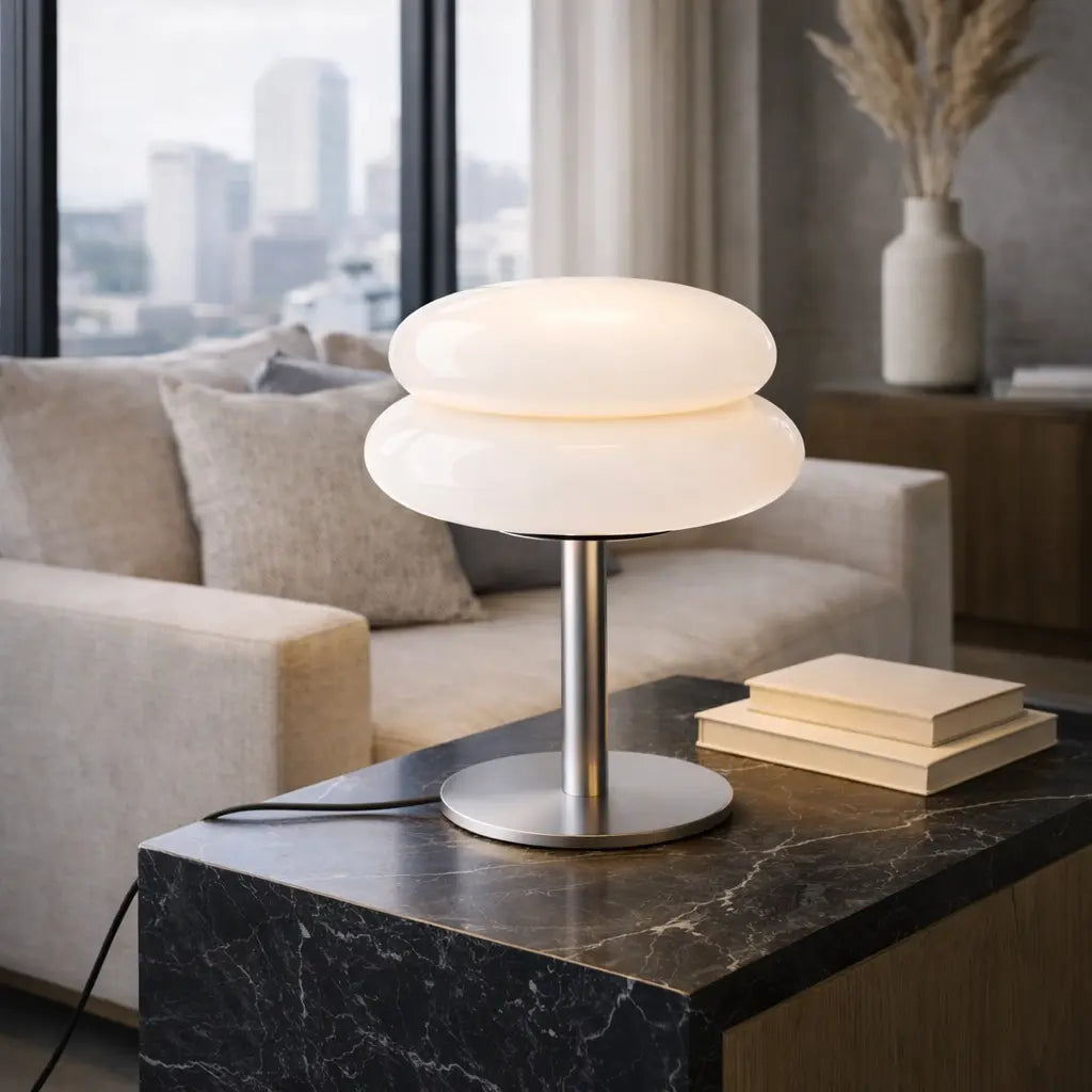 White glass mushroom table lamp on marble side table