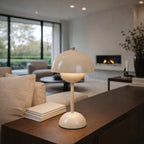 Sand beige mushroom table lamp styled on wooden console in modern lounge