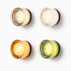 Modern round glass wall light available in four finishes